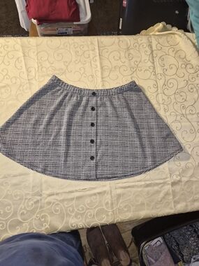 Vylette plaid skirts, including button-front mini skirt